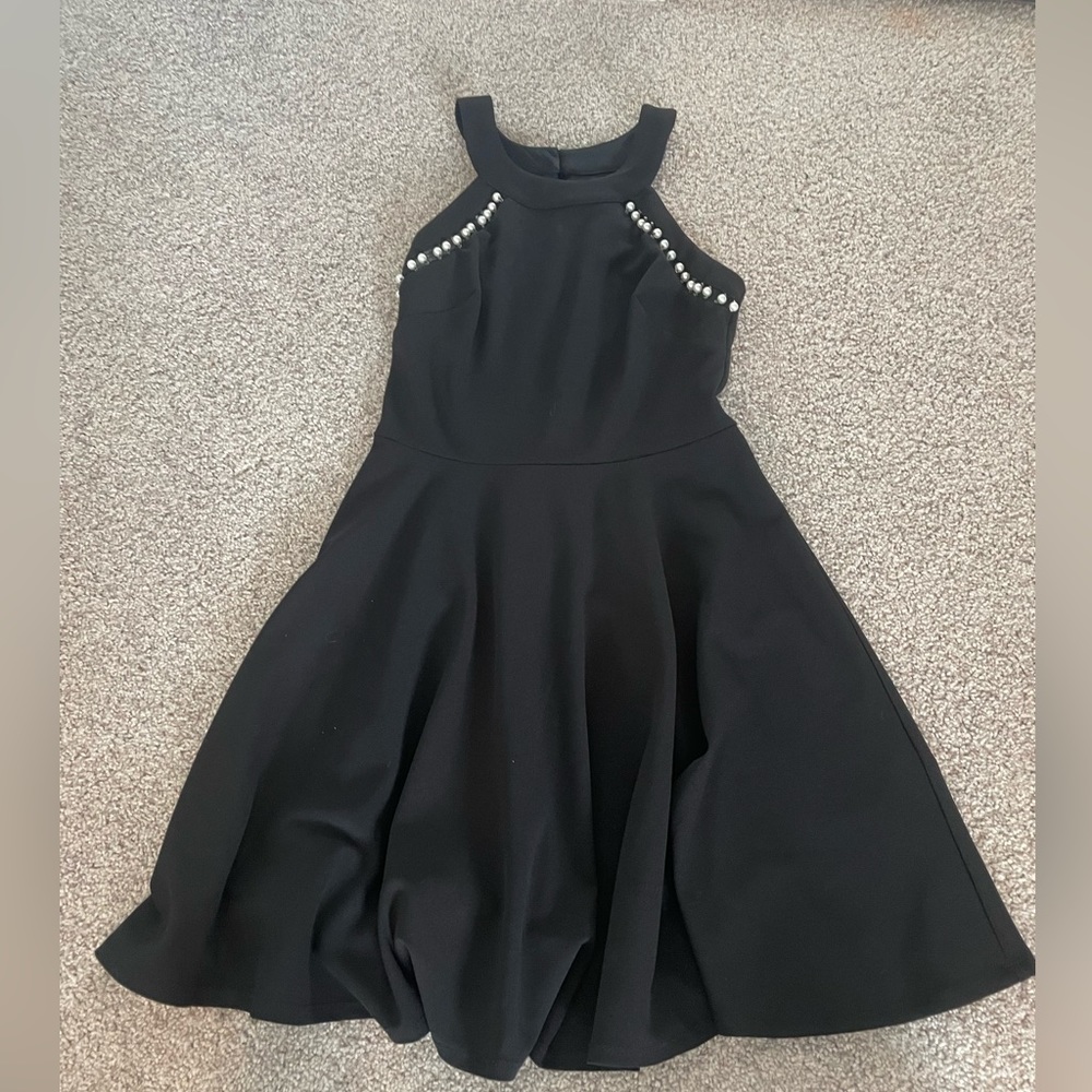 black dress with pearl accents